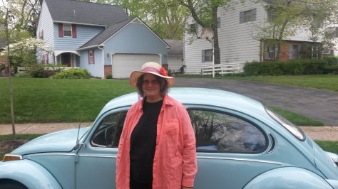 Pat Bertram with her famous blue 1972 Volkswagon.